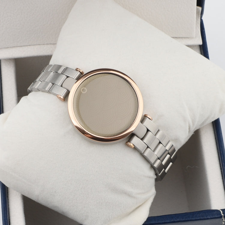 Silver and rose-gold stainless steel wristwatch on a white-gloved wrist