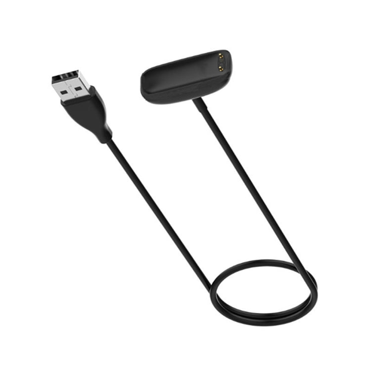 Magnetic charging cable with USB-A plug, black cable, and oval charging dock