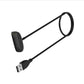 Magnetic charging cable with black oval dock and USB-A connector
