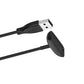 USB-A connector and black magnetic charging dock on the charging cable