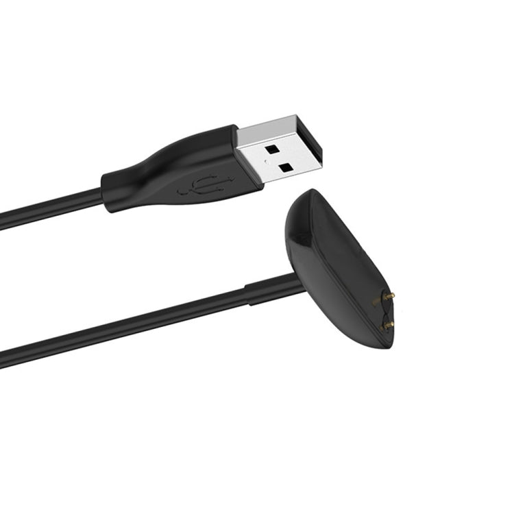 USB-A connector and black magnetic charging dock on the charging cable