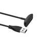 Black magnetic charging dock end with USB-A plug on the charging cable