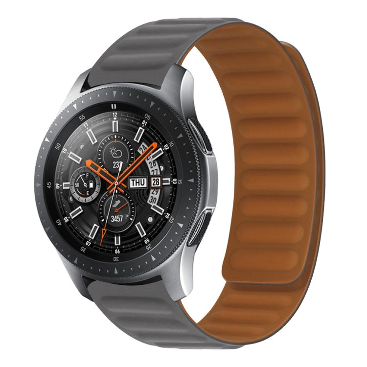 Black silicone magnetic watch band with textured strap and magnetic clasp, angled view