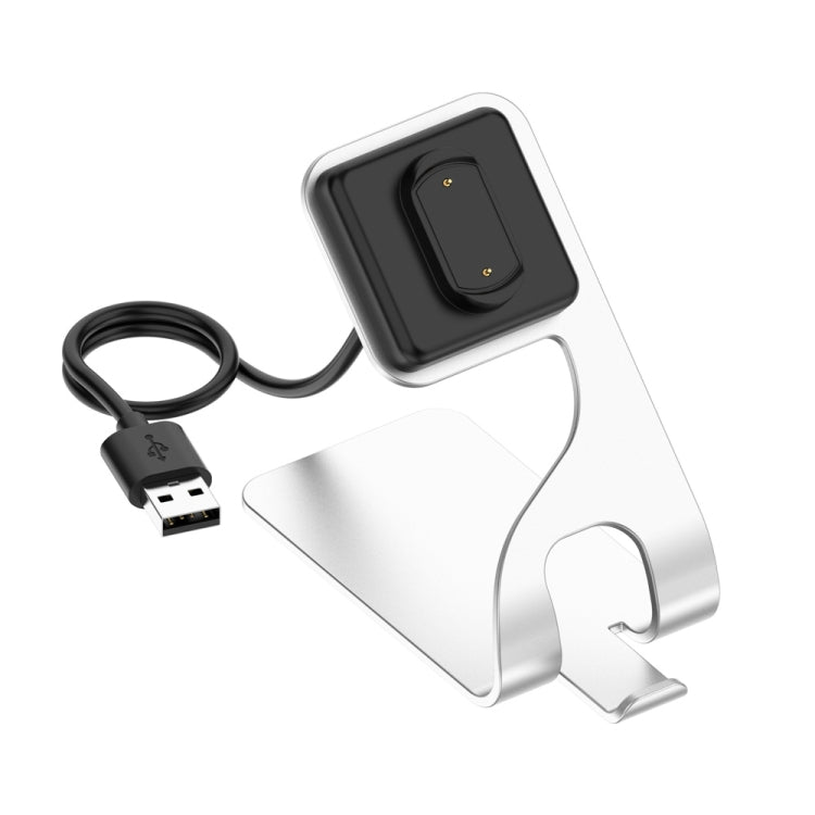 Silver magnetic fast-charging stand with USB cable and watch holder, close angle.