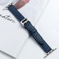 Microfiber leather pin buckle watch strap in dark blue with stitched holes and metal buckle
