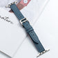 Microfiber leather pin buckle watch strap in light blue with stitched holes and metal buckle