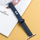 Blue microfiber leather watch strap with double buckle, metal pins and clasp, stitched edge.