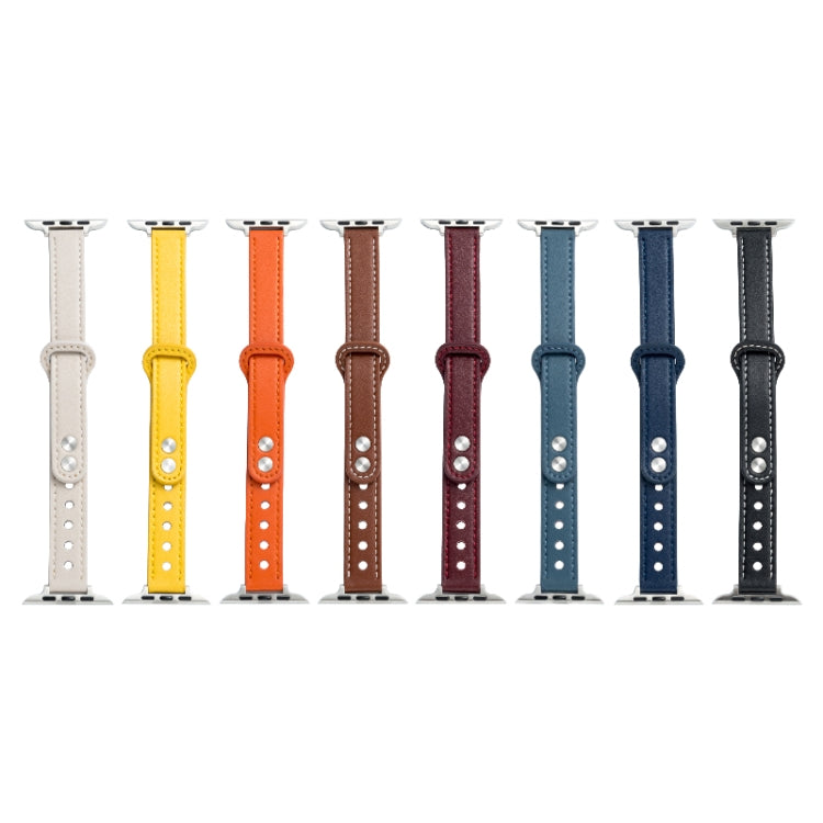 Set of colorful watch straps with double buckles, perforations, and metal ends