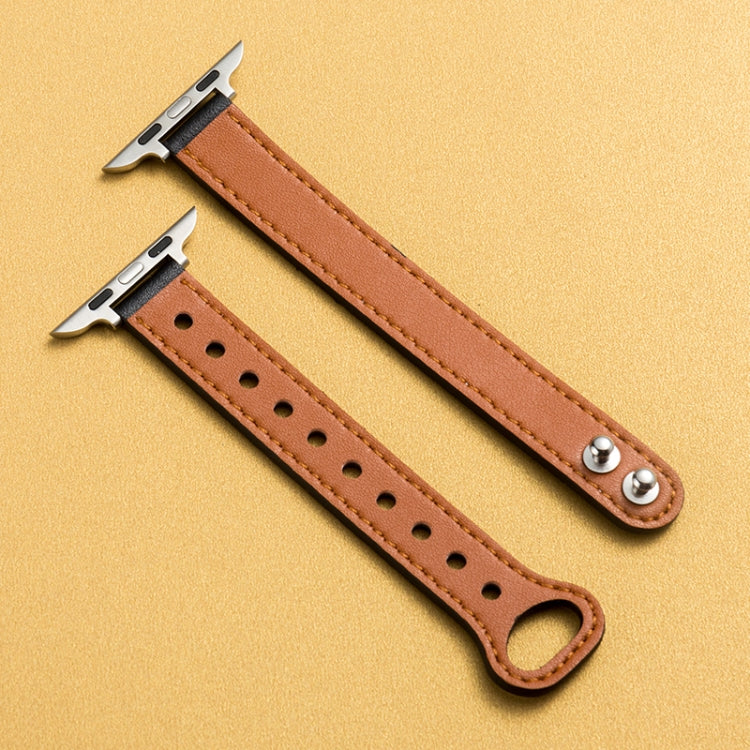 Tan/brown watch strap with double buckle, perforations, and silver-tone metal ends