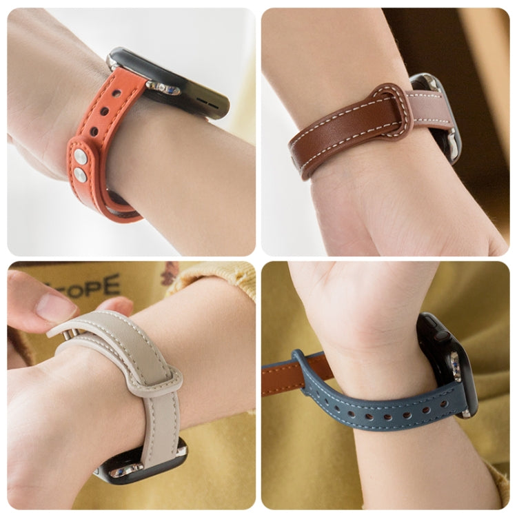 Watch strap in orange and brown with double buckle and perforated holes