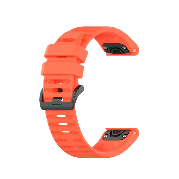 Orange silicone sports watch strap with perforated holes and buckle, two-piece design