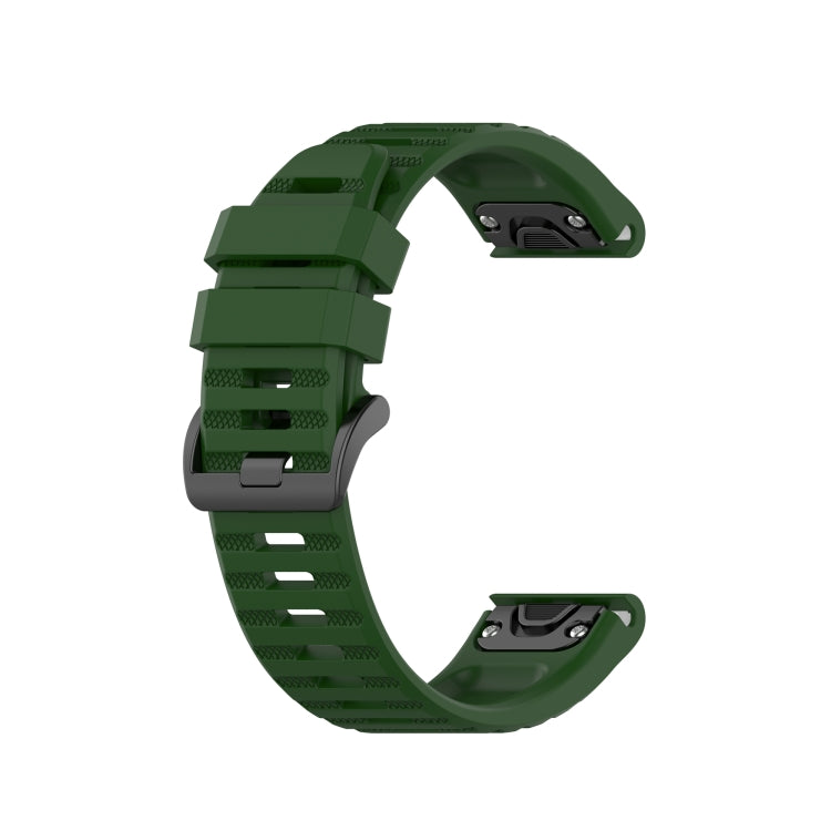 Silicone sports watch strap with buckle, green and gray underside.