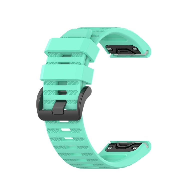 Silicone sports watch strap, mint green, with buckle and vented strap pattern.