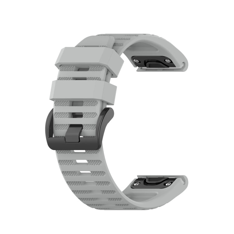 Silicone sports watch strap, light gray, with buckle and perforated texture.