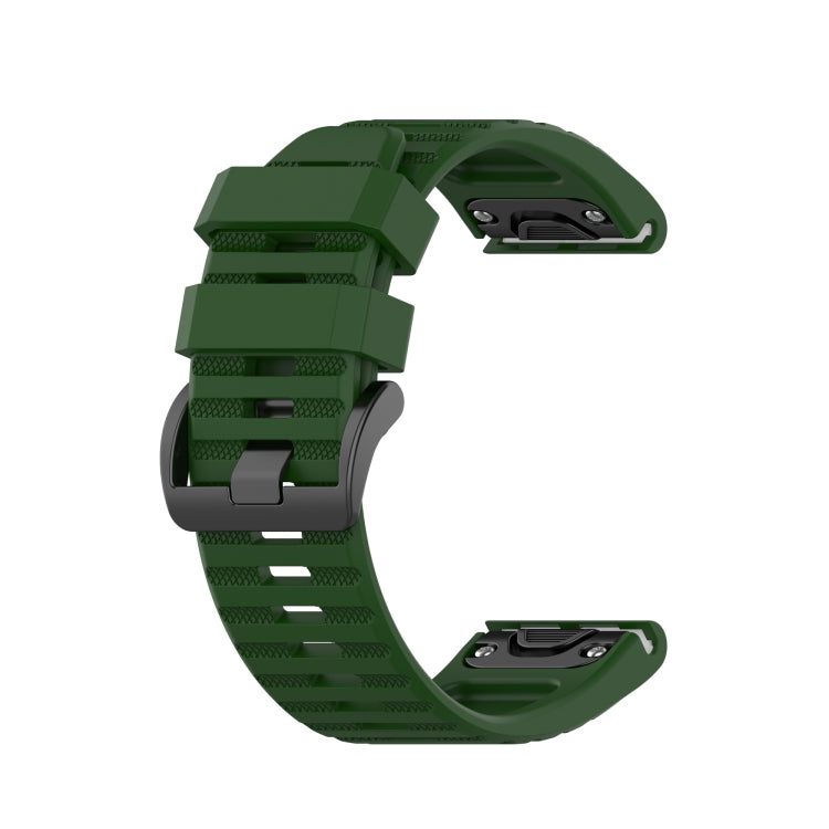 Silicone sports watch strap, green, with buckle and adjustable hole rows.