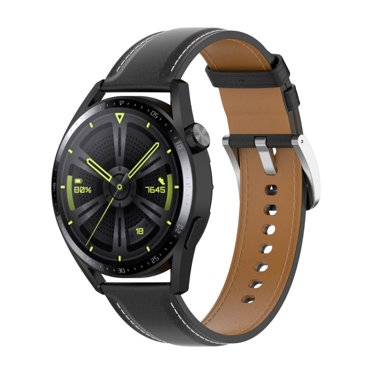 Black and gray watch band on smartwatch with perforated strap and metal clasp