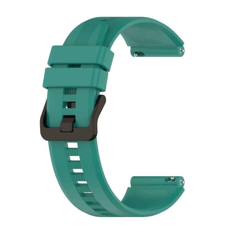 Silicone watch band in teal green with quick-release clasp and perforated strap holes