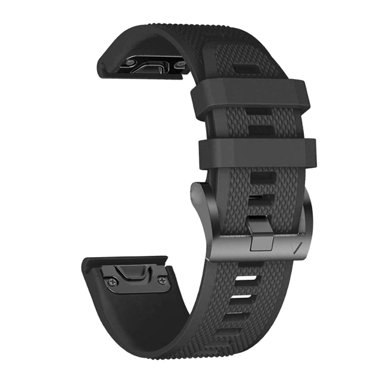 Silicone watch strap in black; clasp and pin area shown on textured band.