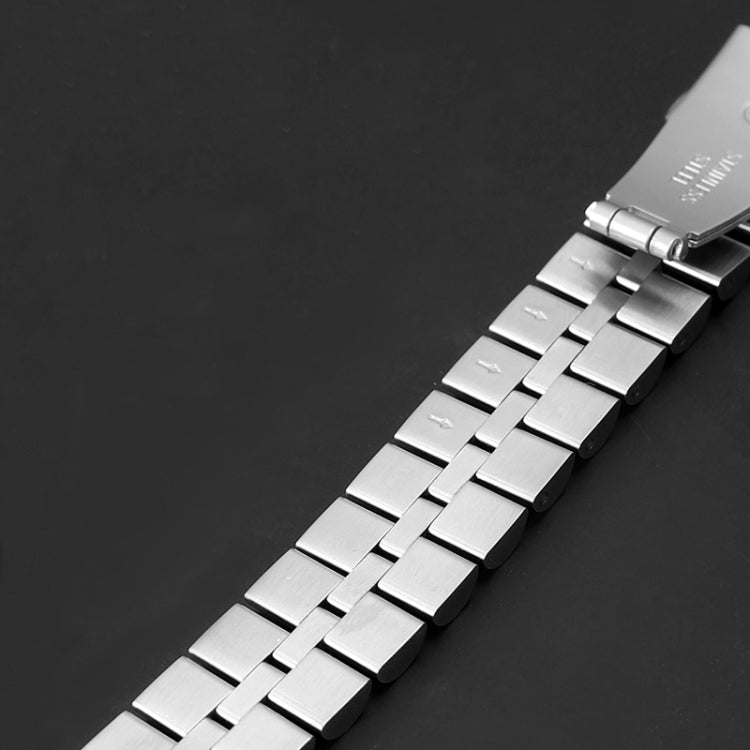 Close-up of silver three-bead metal watch links for Apple Watch