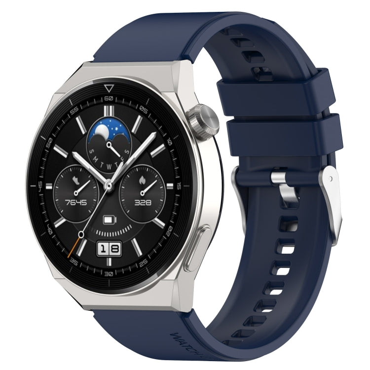 Silicone watch strap with silver buckle, dark navy blue band and perforated holes