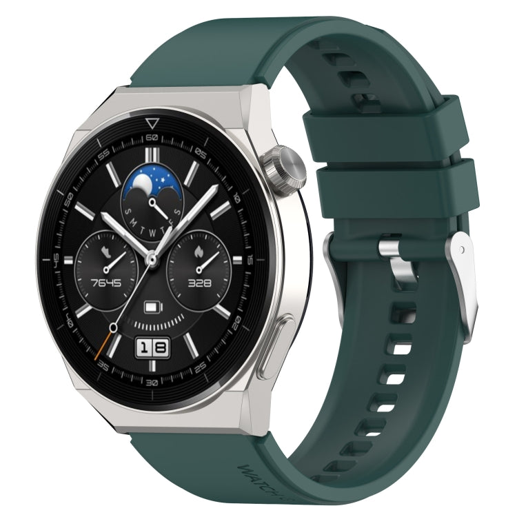 Silicone watch strap with silver buckle, teal green band and perforated comfort holes