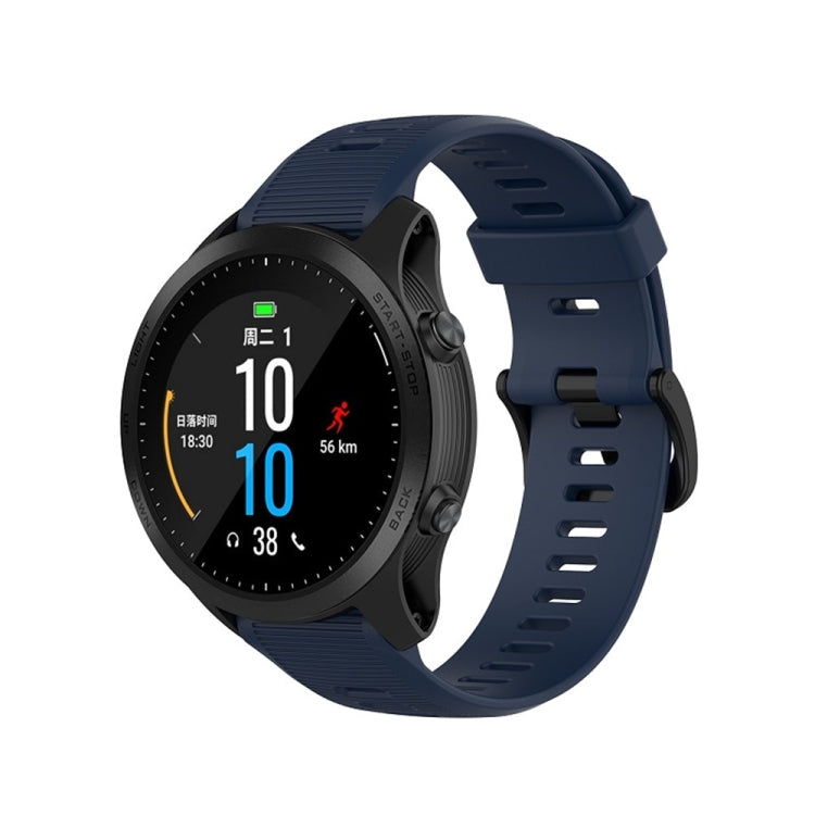 Navy blue silicone smartwatch watch band with textured holes and quick-release buckle