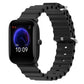 Black silicone watch band with perforated links and metal pin clasp