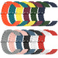 Multiple silicone watch bands in assorted colors, with metal pin buckle and round hole links