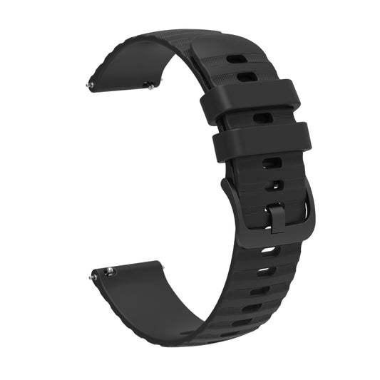 Black silicone wavy dotted watch band, side view with buckle and perforations.