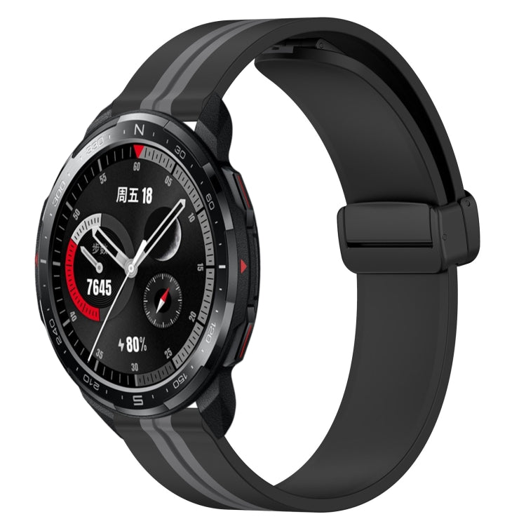 Silicone smartwatch band with folding magnetic clasp, black with gray accent stripe
