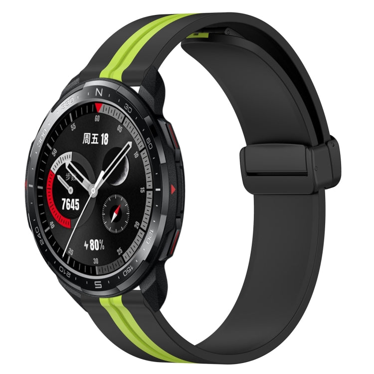 Silicone smartwatch band with folding magnetic clasp, black with lime green accent stripe