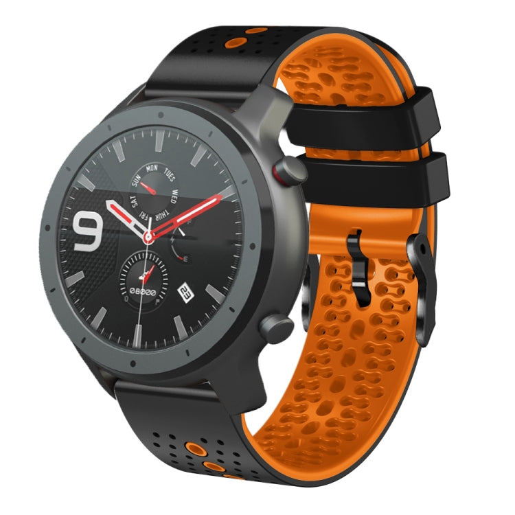 Perforated two-tone silicone watch band with orange and black strap segments