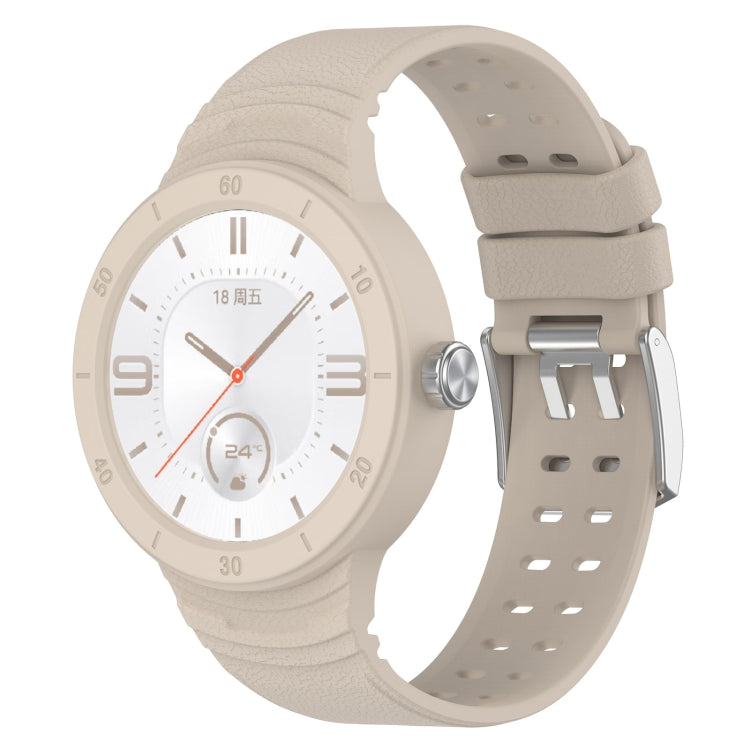 Cream silicone watch band with metal buckle and vented perforation pattern