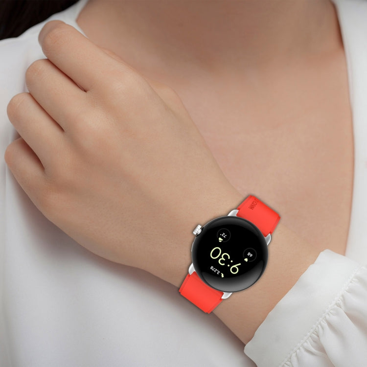 Red silicone watch band with metal connector on wrist, 41mm smart watch