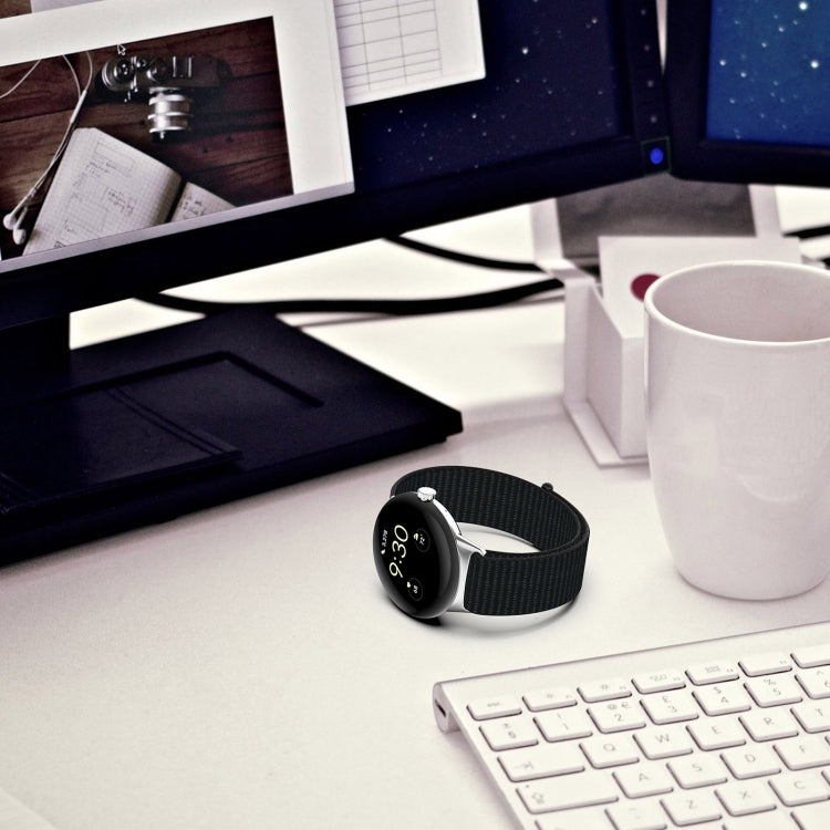 Black nylon weave watch band on smartwatch with metal clasp