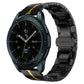 Black stainless steel watch band with gold accent links, armor style.