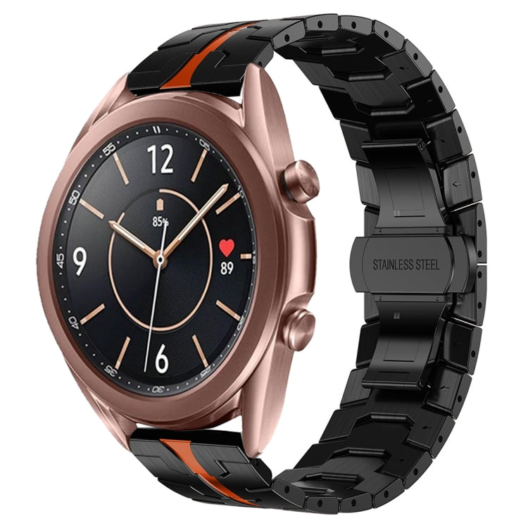 Black stainless steel watch band with orange inlay, paired with rose gold smartwatch