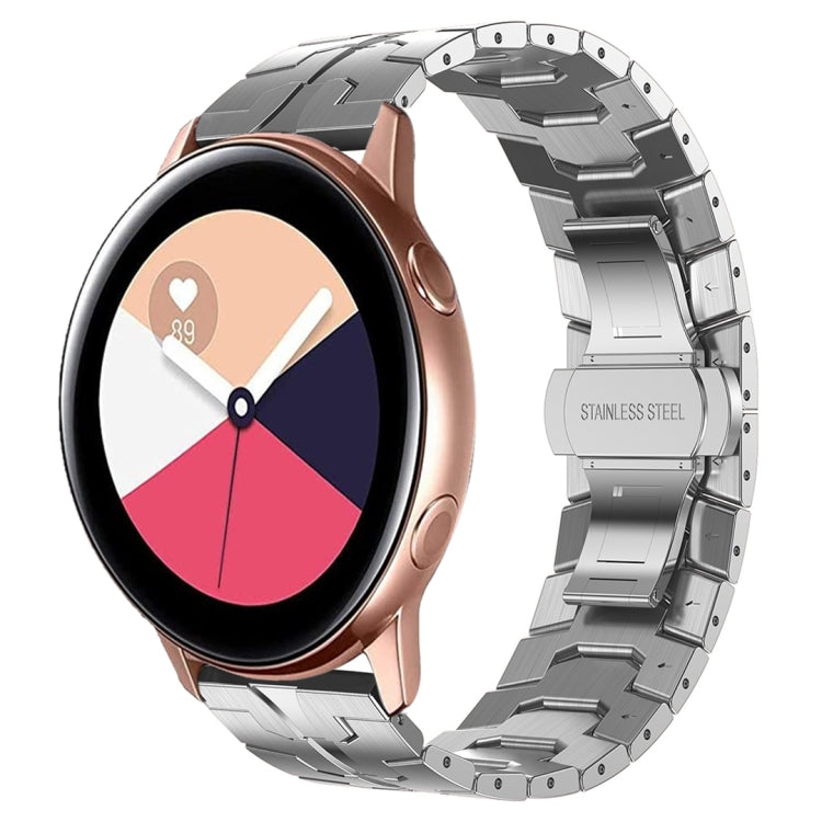 Black smartwatch with pink and blue face, paired with silver stainless steel band
