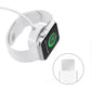 Magnetic charger puck attached to a white smartwatch with charging cable