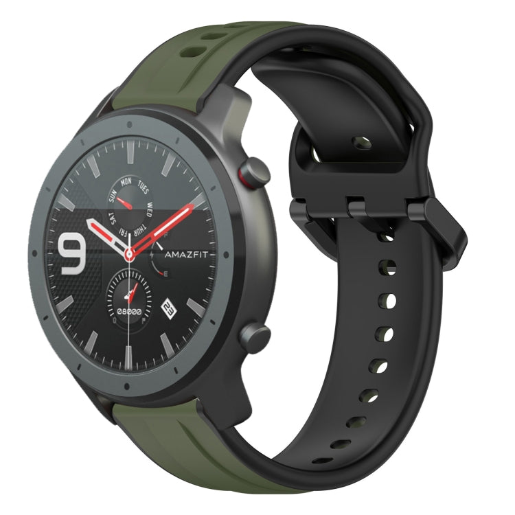 Silicone watch band with dark green and black two-tone loop design, pin-hole strap