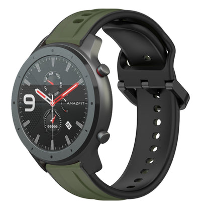 Silicone watch band with dark green and black two-tone loop design, pin-hole strap