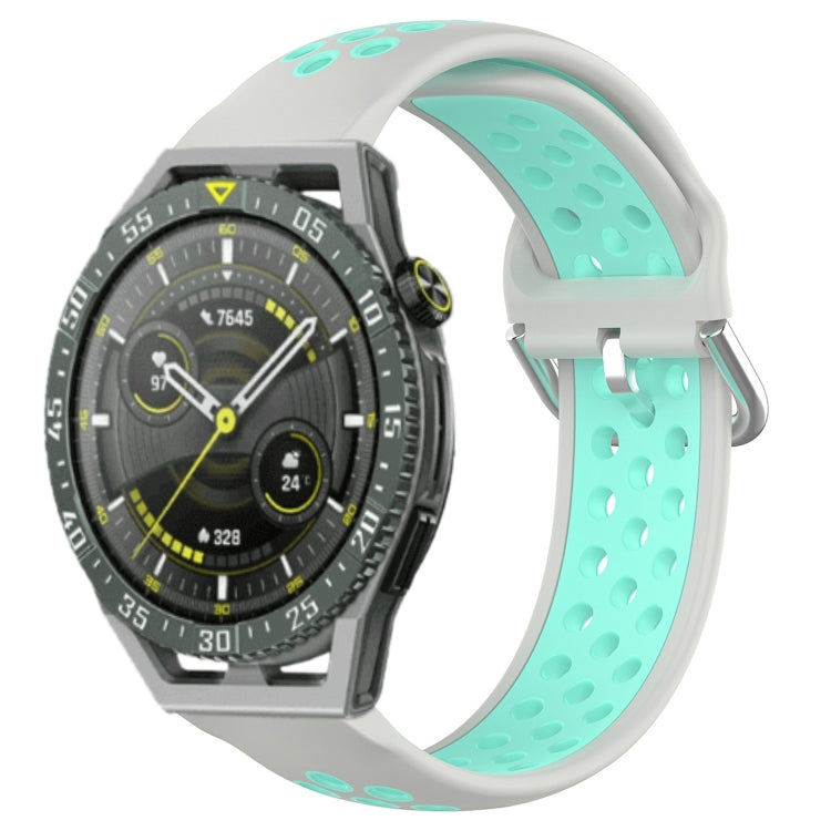 Perforated sports silicone watch band in mint green with oval ventilation holes and gray base