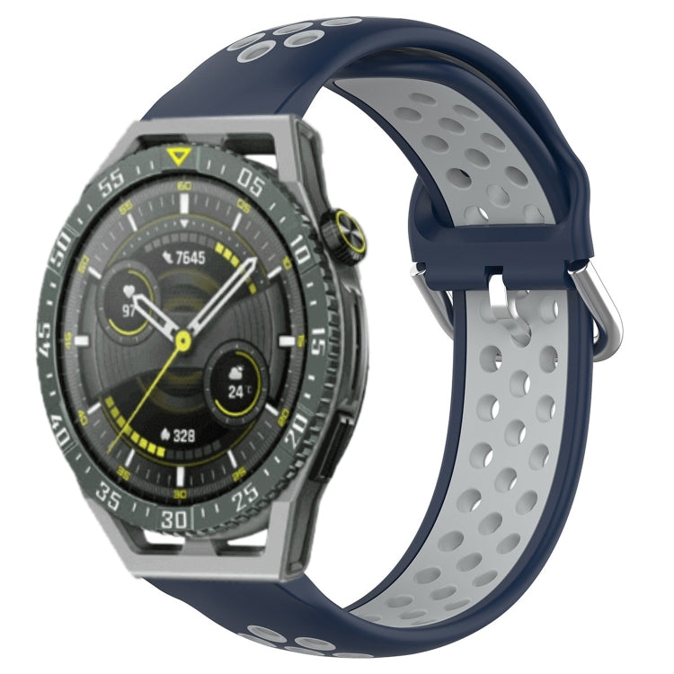 Perforated sports silicone watch band in dark blue with oval ventilation holes and gray underside