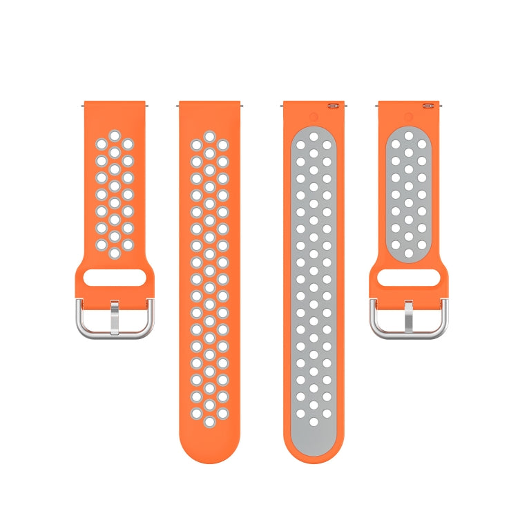 Perforated breathable silicone watch band in orange with white dot holes and metal buckle.