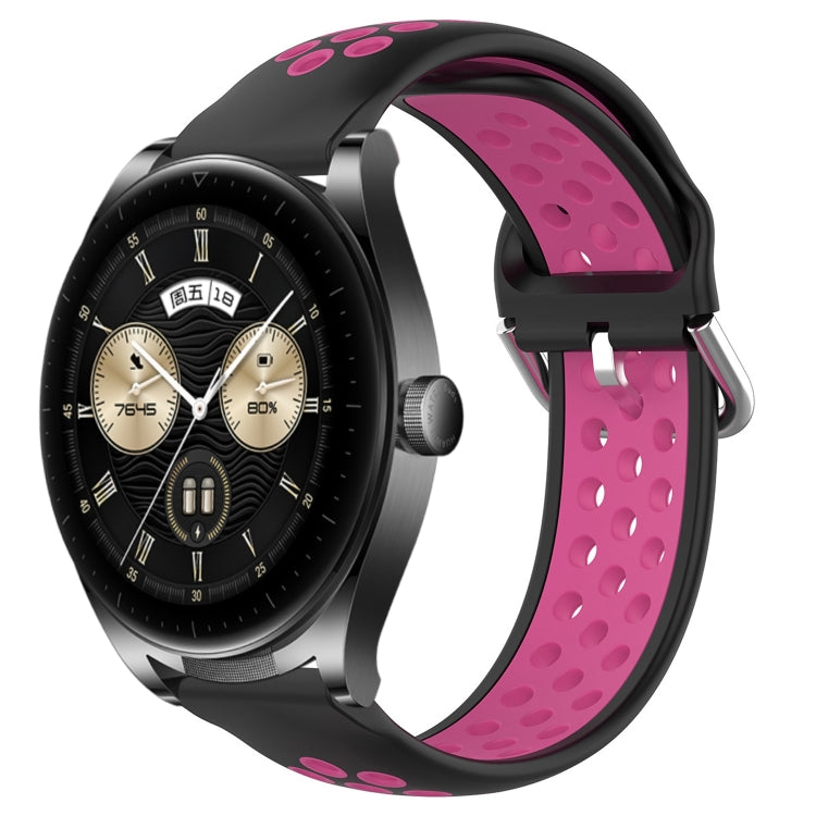 Black and pink perforated silicone sports watch band with vent holes and buckle tabs