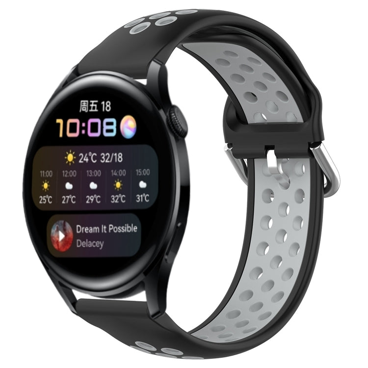 Perforated silicone sports watch band, light gray with metal clasp and black edges.