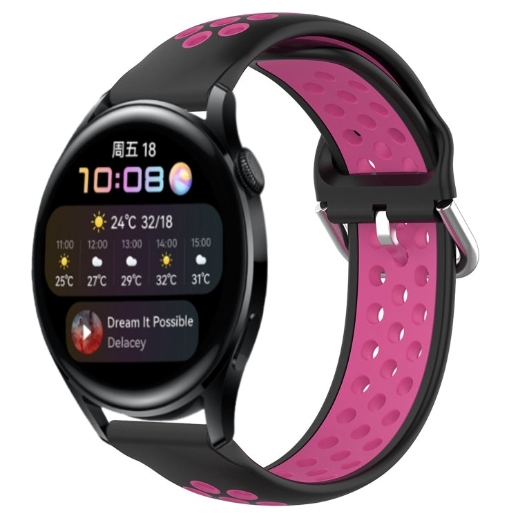 Perforated silicone sports watch band, pink and black with metal clasp.