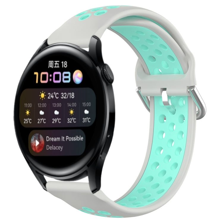 Perforated silicone sports watch band, mint green with metal clasp.