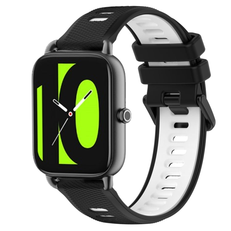 22mm two-color silicone watch band in black with white accents, secure buckle.