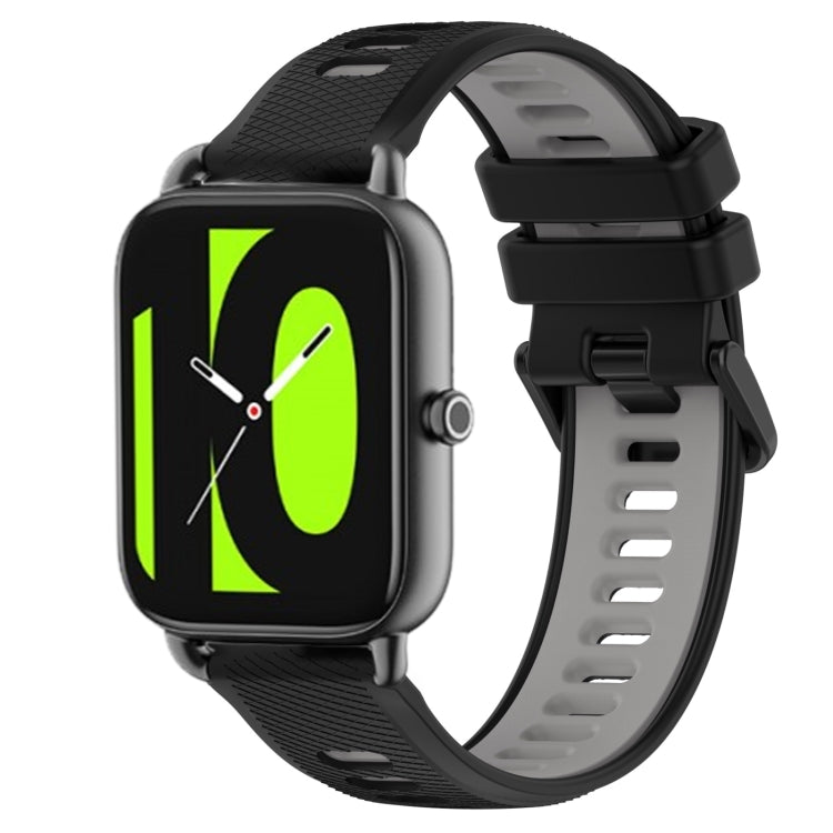22mm two-color silicone watch band in dark gray with black accents, secure buckle.